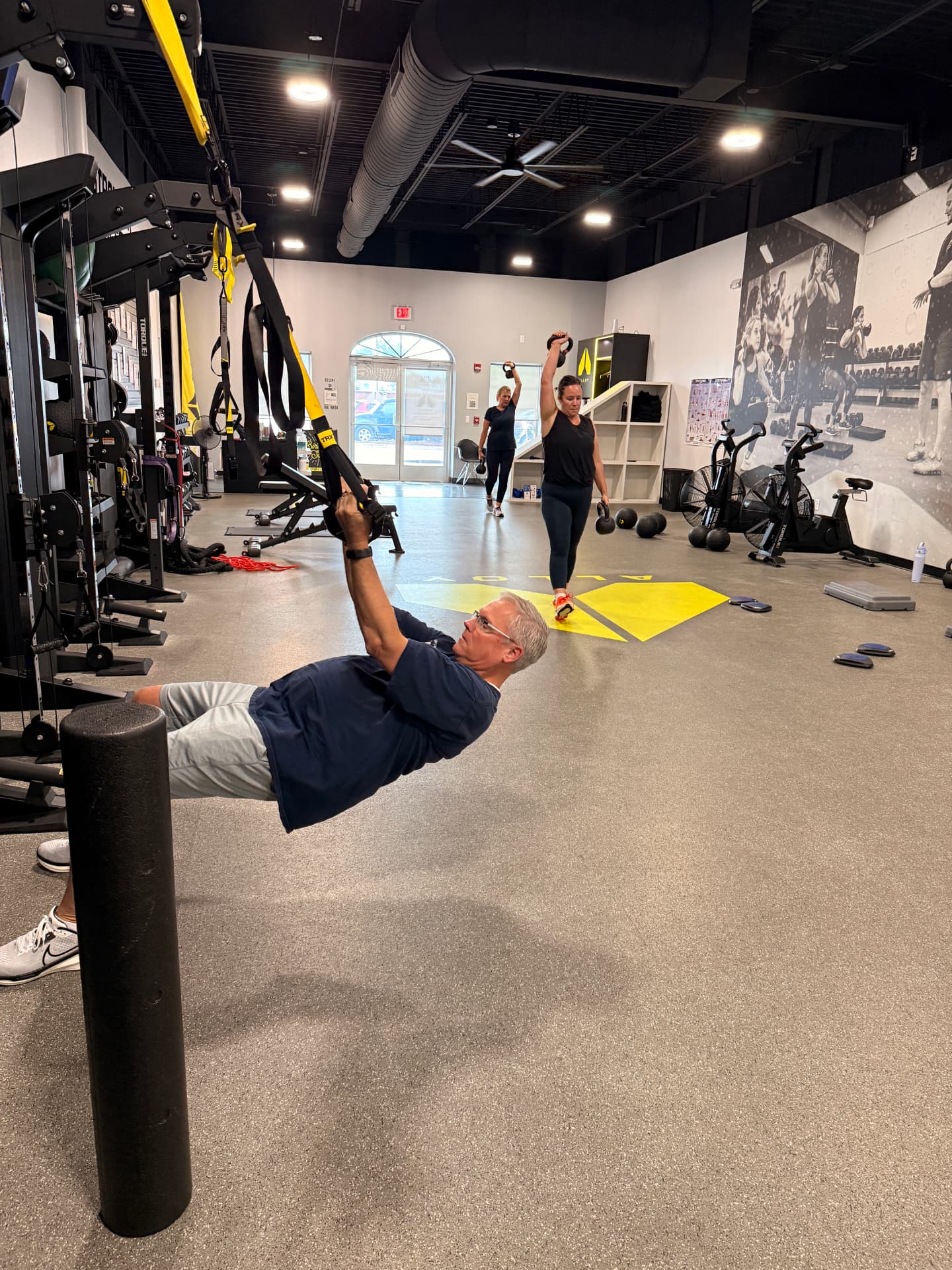 Mt. Juliet members training with suspension straps and kettlebells